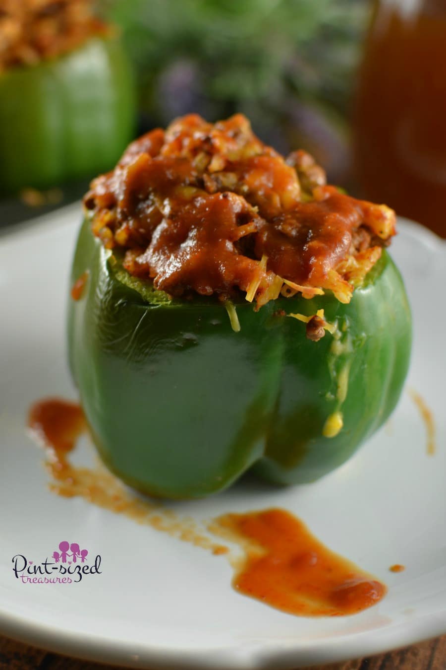 Gorgeous green peppers are loaded with a seasoned beef, tomato sauce and rice mixture.