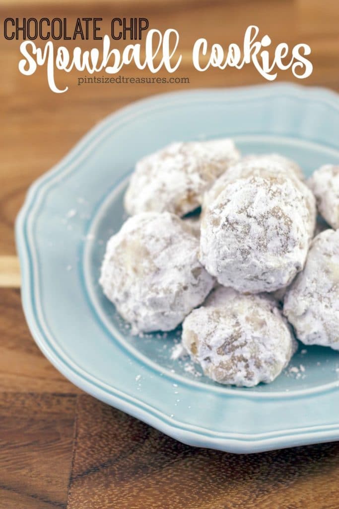 A classic Christmas cookie recipe, snowball cookies, are getting all dressed up with hidden chocolate chips inside every bite! So yummy. So perfect. So cookie-exchange worthy! #chocolatechips #snowballcookies #Christmascookies #holidaycookies #easycookies #chocolatecipsnowballcookies #cookieexchangerecipes #easyChristmascookies #baking #cookiebake