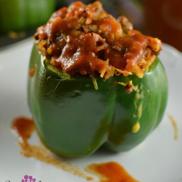 Gorgeous green peppers are loaded with a seasoned beef, tomato sauce and rice mixture. Top these off with cheddar cheese for an obey, gooey comfort food that everyone loves!