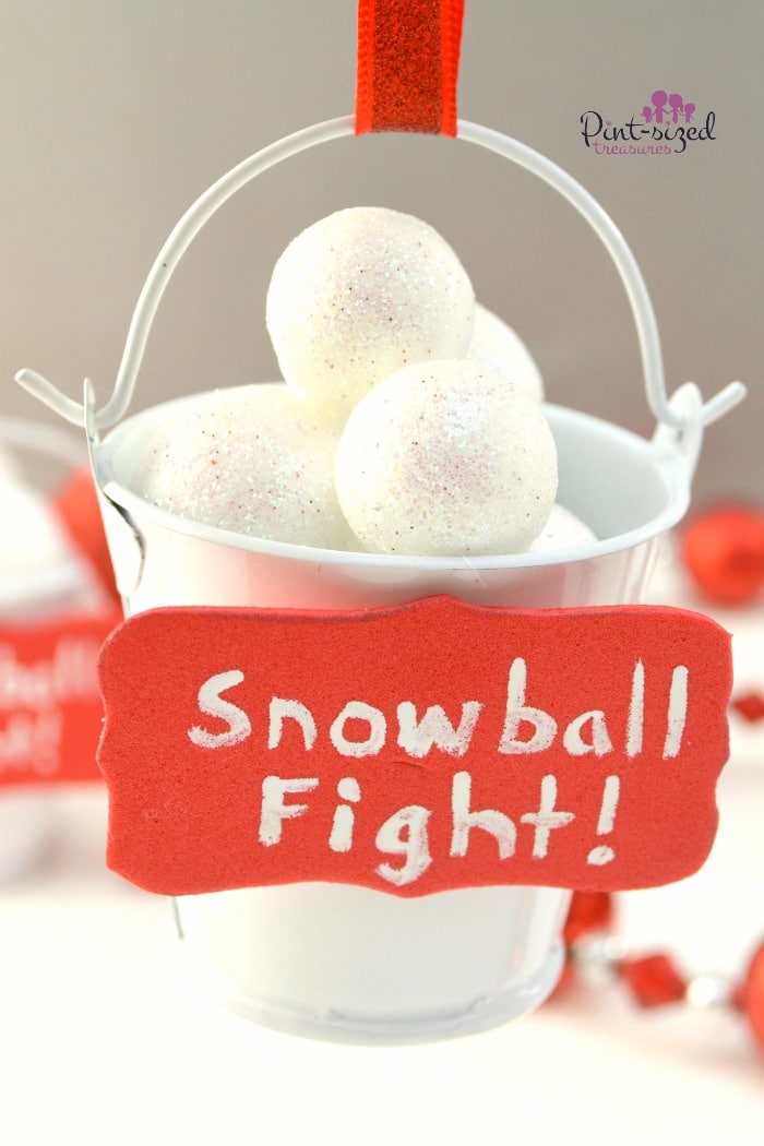 Super-cute! These easy DIY Snowball Fight Christmas Ornaments are super creative and unique! Kids can even make these -- with adult supervision. Too cute to miss! Can't wait to hang these snowball fight ornaments on my Christmas tree!
