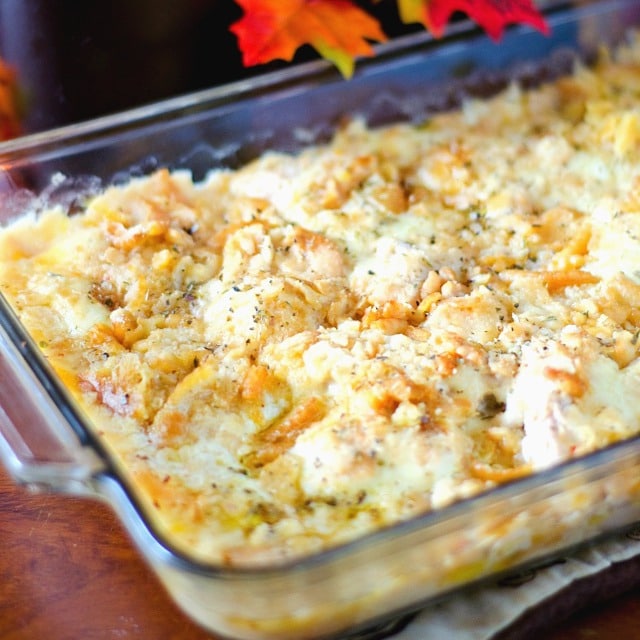 chicken casserole topped with cracker crumbs, Swiss cheese and chicken broth