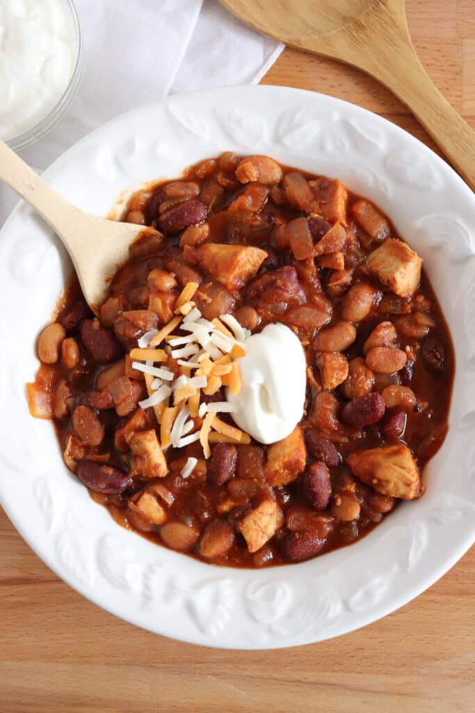 easy chicken chili being served in bowl