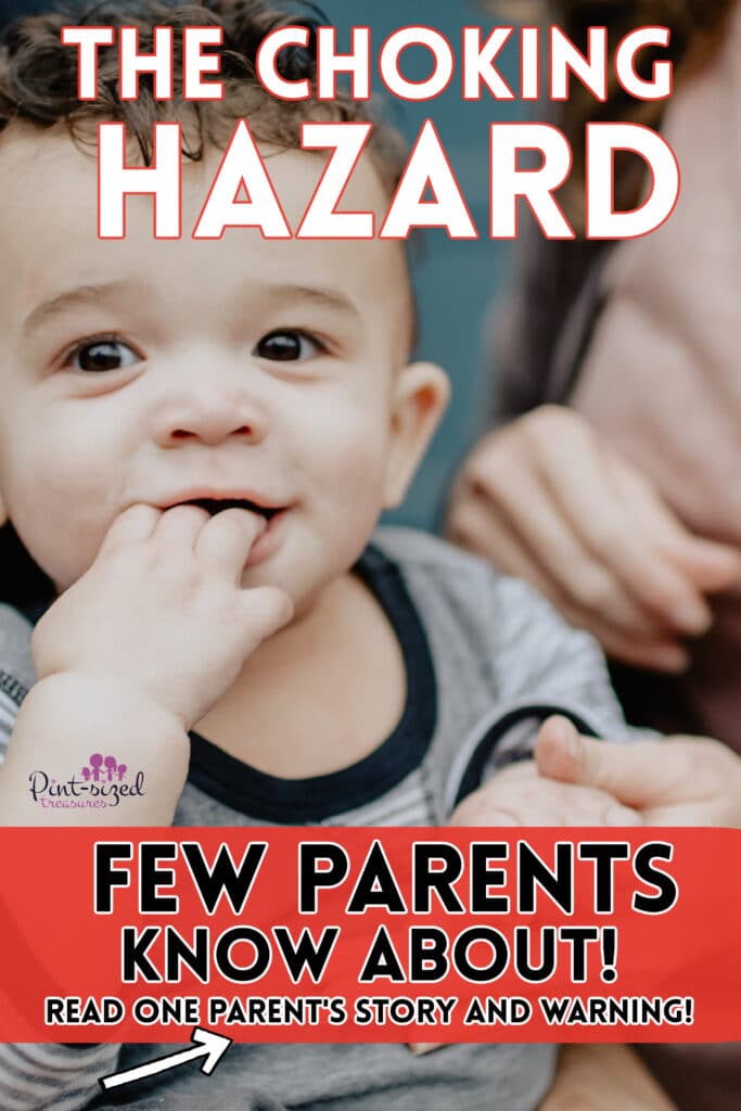 a child chewing on his fingers while parents protect him from choking hazards