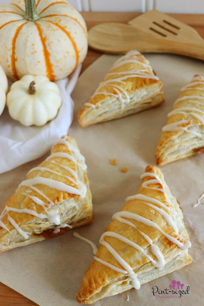 pumpkin turnovers on parchment paper