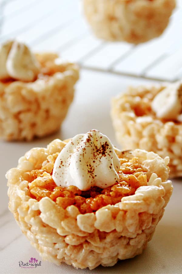 pumpkin pie Rice Krispie treats with whipped cream on top