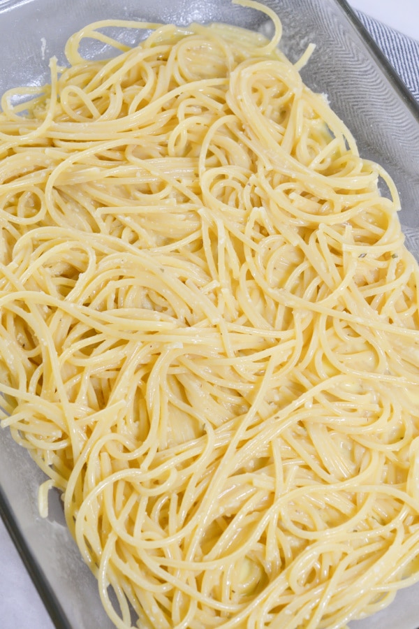 noddles and creamy cheese mixture combined for pizza spaghetti