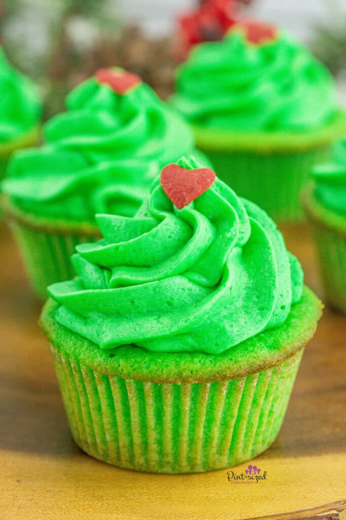 frosted and decorated Grinch cupcake recipe
