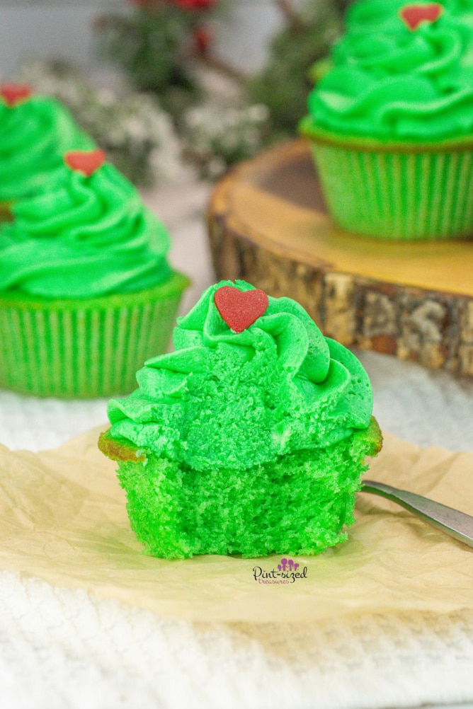 green grinch cupcake with a red heart