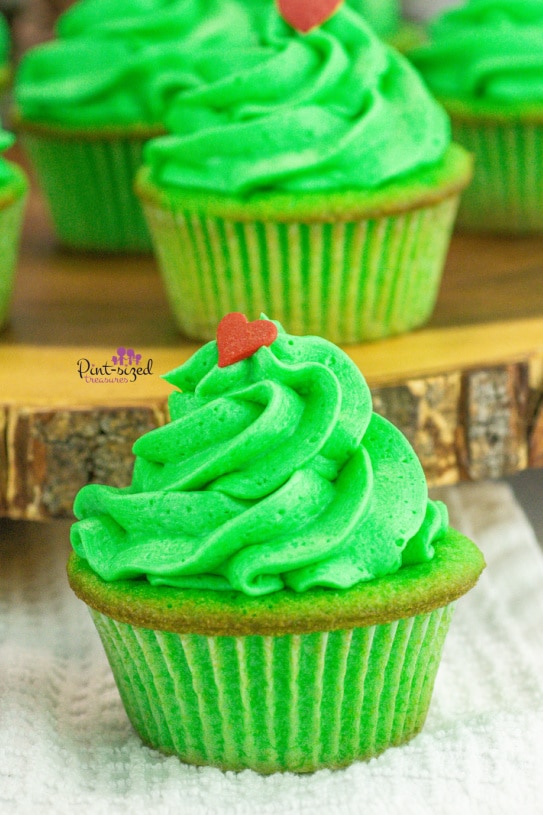 easy Grinch cupcake that's been frosted