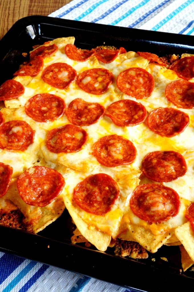 making pizza nachos on sheet pan