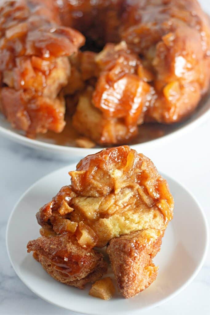 slice of apple fritter monkey bread on plate