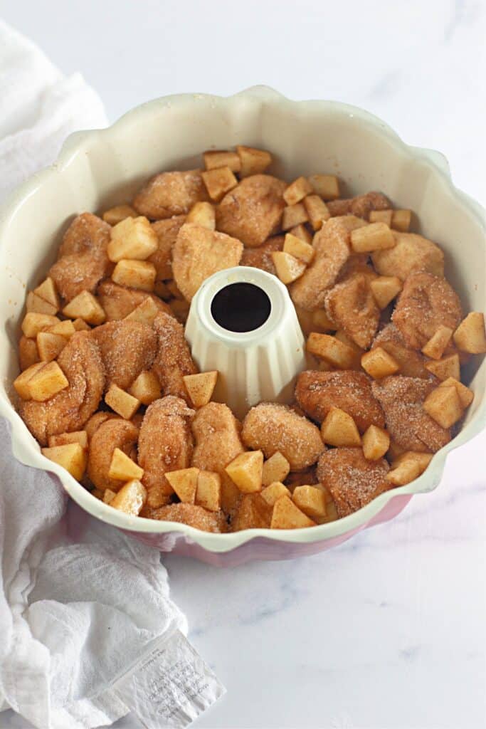 layering the apple fritter monkey bread