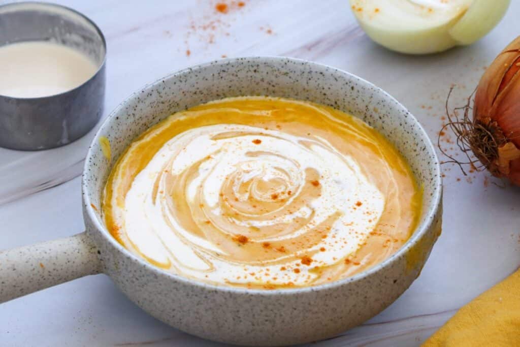 creamy pumpkin soup in bowl
