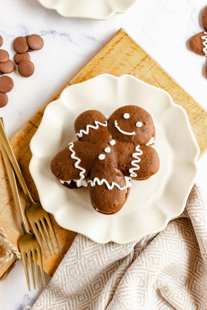 chocolate whoopie pie gingerbread man on white plate
