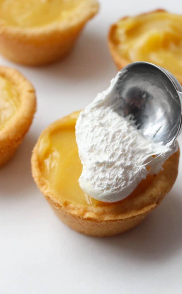 making the lemon meringue cookie cups
