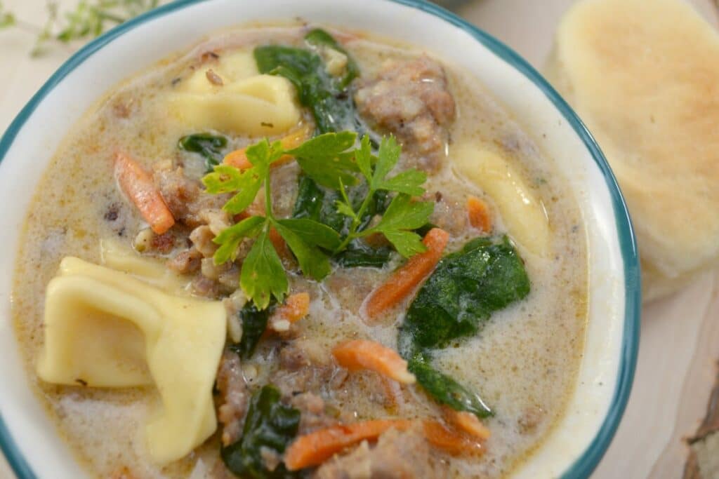 sausage spinach tortellini soup in bowl