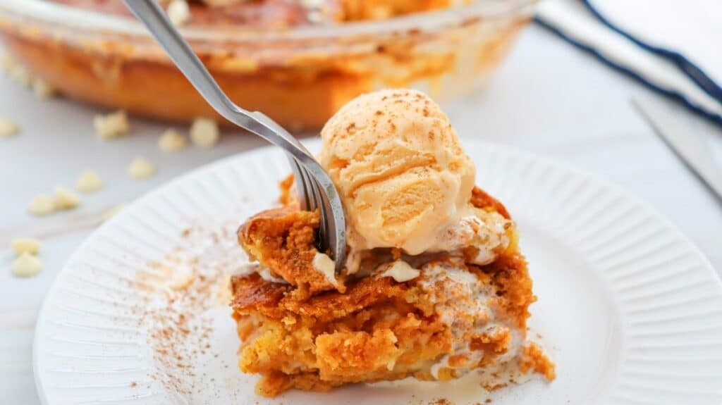 getting a piece of the pumpkin dump cake
